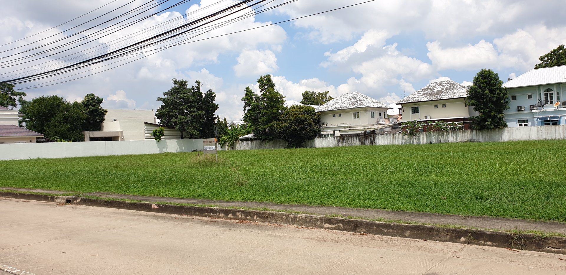 ขายที่ดิน-หมู่บ้านวินด์มิลล์-แปลงใหญ่สี่เหลี่ยม-454-ตรวา-ติดถนนเมน