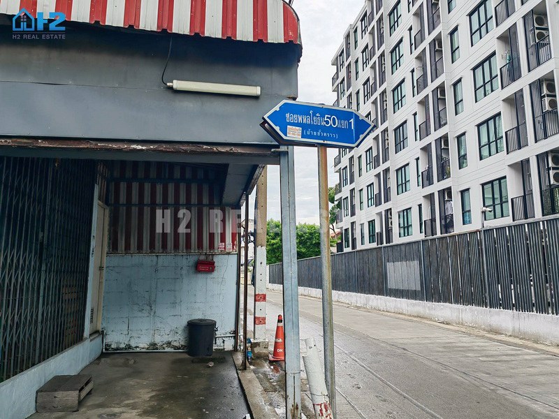 ขายถูกที่ดิน-พร้อมสิ่งปลูกสร้าง-เนื้อที่-21550-ตรว-สี่เหลี่ยมสวย-ซอยพหลโยธิน50-แยก1