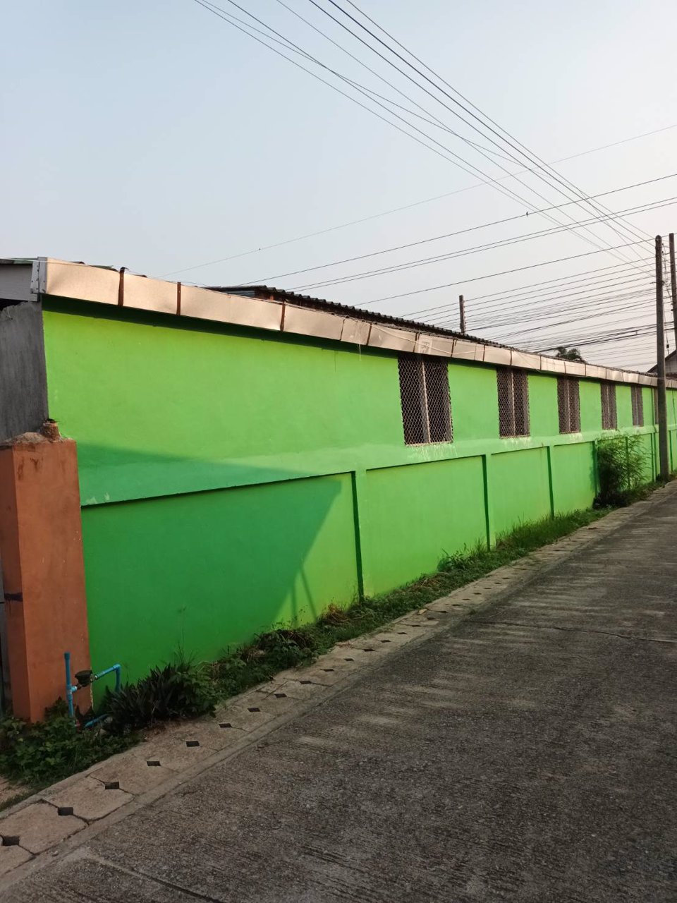 ขายบ้านพร้อมที่ดิน-ติดถนนใหญ่สายเวียงชัย-เชียงรุ้ง