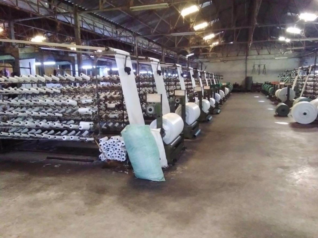 ขายโรงงานพร้อมกิจการและใบอนุญาต-ผลิตกระสอบพลาสติกและถังพลาสติกสำหรับปั่นเส้นด้าย-จนครปฐม